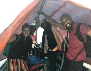 crew-in-rain-on-the-boat-to-lamu